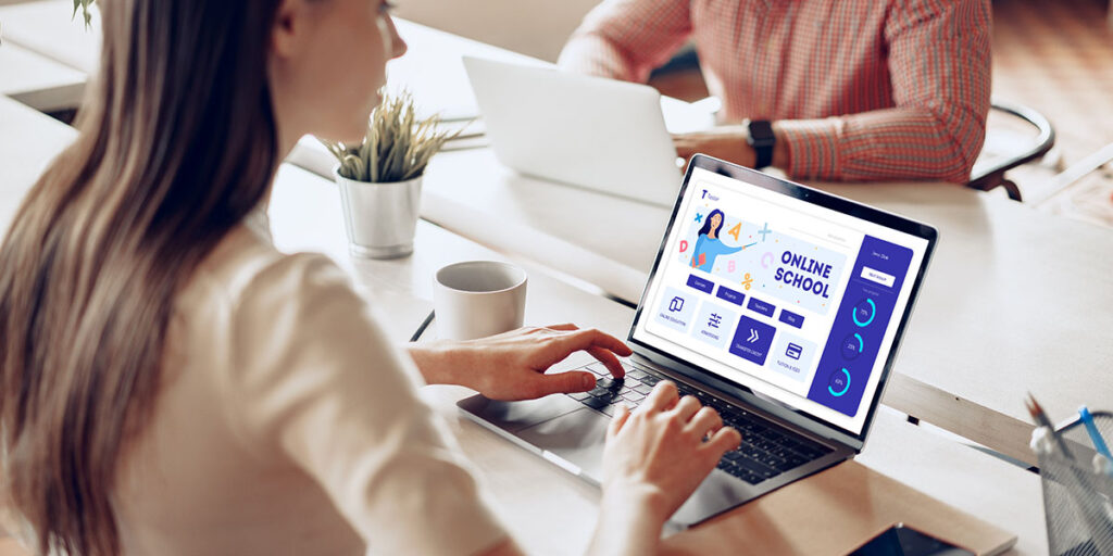 Small business owner rewriting a homepage headline to clearly communicate what they do and who they serve to first-time visitors